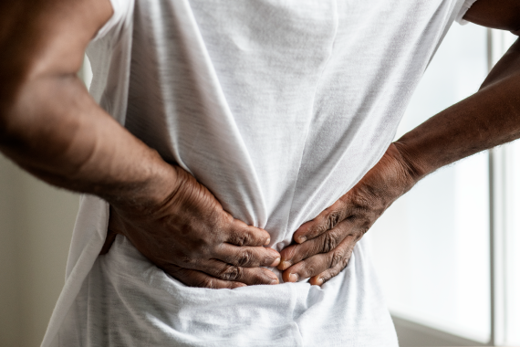black-man-suffering-back-pain-2022-09-16-09-19-55-utc
