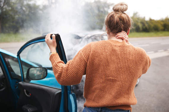rear-view-of-female-motorist-with-head-injury-gett-2021-08-26-16-14-36-utc