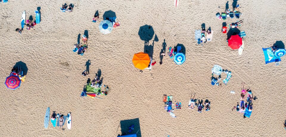 Top view colored umbrellas on beach