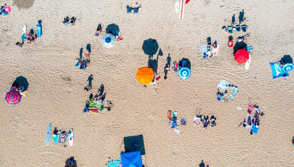 Top view colored umbrellas on beach